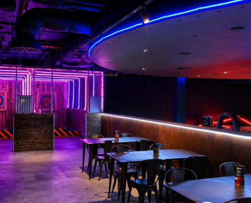 axe-throwing-court-social-bar Social barn concept with axe throwing and lounge area