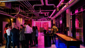 axe throwing and shuffel board Social bar concept with different games with neon lights