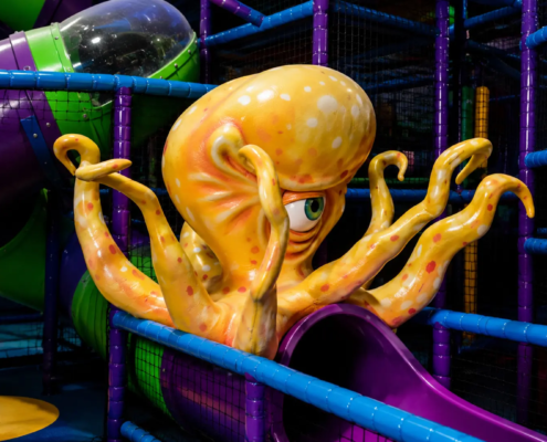 Big yellow octupus on a slide