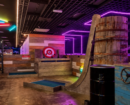 social bar concept with interactive mini golf Social bar with mini golf and other challange games